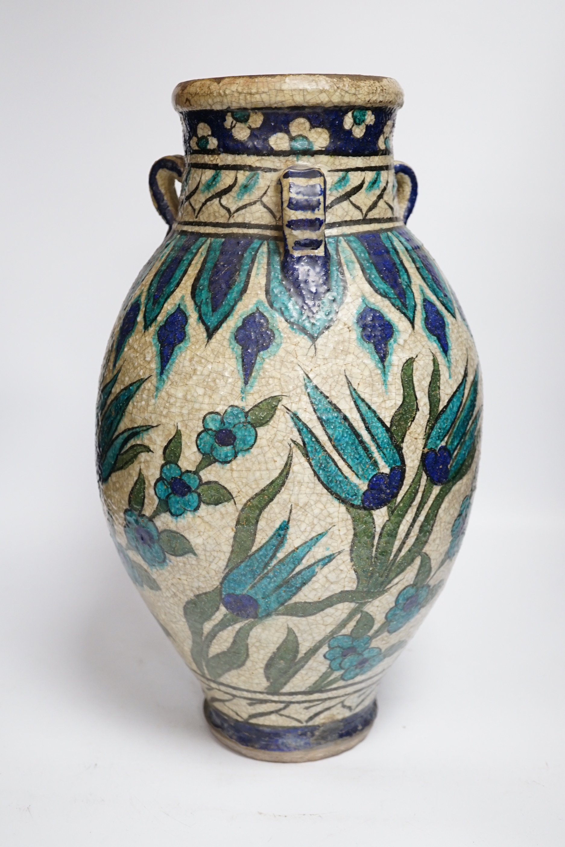 A Persian fritware vase in Iznik style, 40cm high
